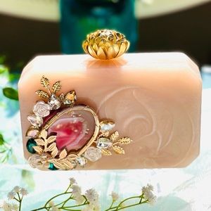 Ivory resin clutch with beads and stones embellishments🥰